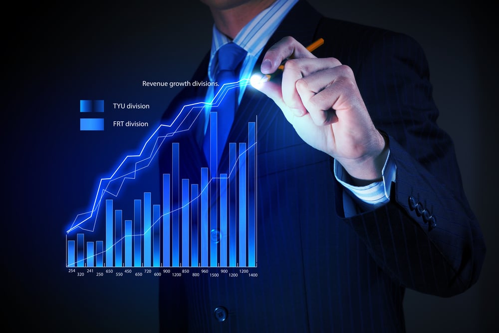 Closeup image of businessman drawing 3d graphics